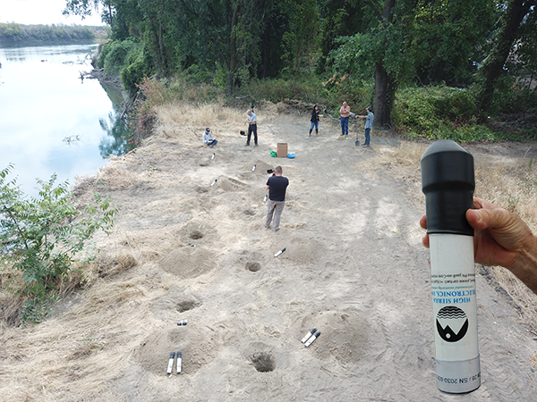 Installation of REMS Remote Erosion Monitoring System on a levee